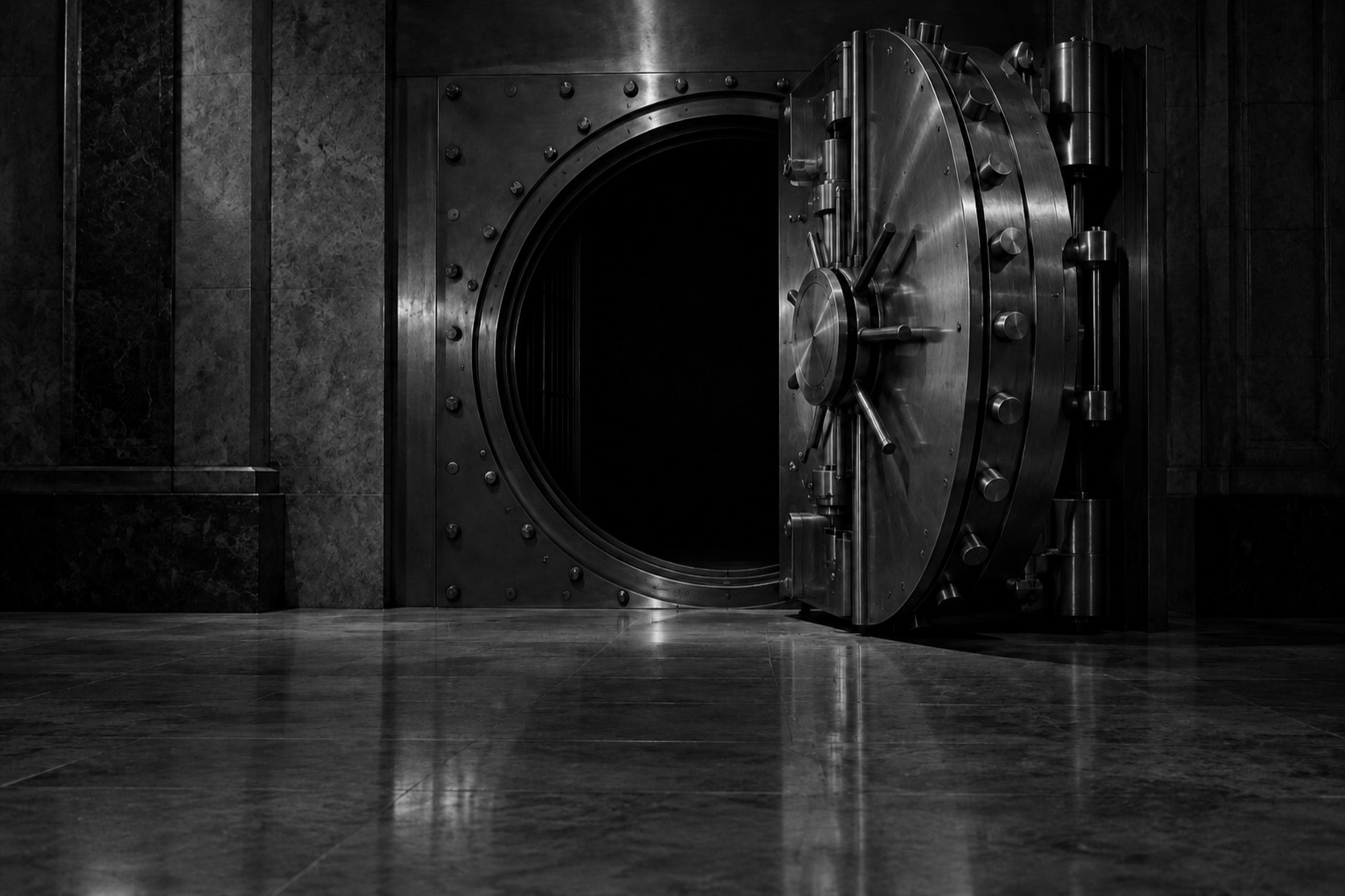 A bank vault door standing ajar after hours, its wheel and bolts in low light