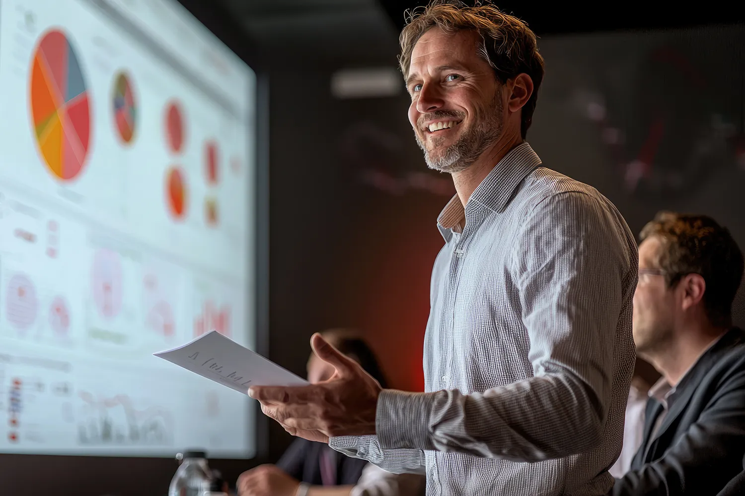 Marketing team and client reviewing performance reports together, symbolizing long-term strategic partnership and scalable growth